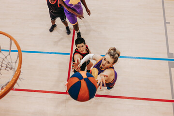 Rising to the challenge: Female basketball players push through adversity
