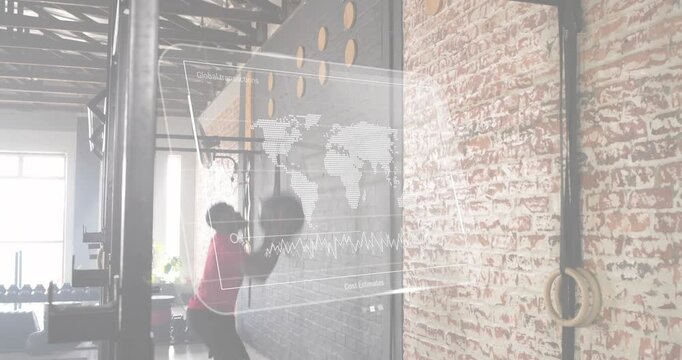 Man retrieving medicine ball and slamming into brick wall holes with fitness overlay tracking data