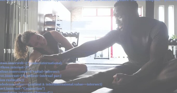 Stretch partner initiating hamstring stretch placing hand on foot in gym with drifting code overlay