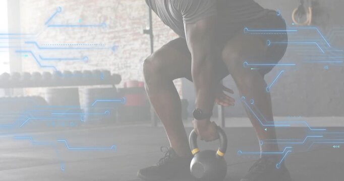 Fitness enthusiast adjusting stance over kettlebell wrapping grip and lifting into front rack clean