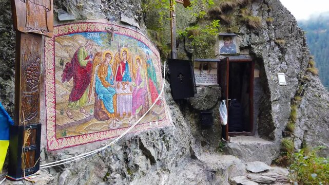 The cell of Saint Arsenie Boca in the Fagaras Mountains - Romania. It is a cave carved into the rock where the father retired as a hermit