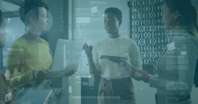 Team of three reviewing overlaid digital charts after tapping devices for business insights - Powered by Adobe