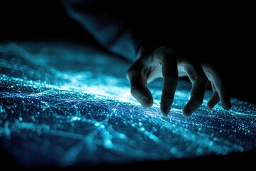 A hand reaches out, touching an illuminated, interconnected network of glowing blue lines
