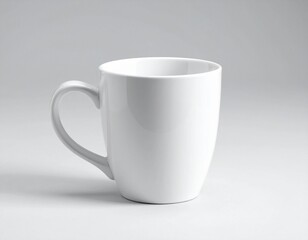 Plain white ceramic mug with smooth surface and rounded body, upright with handle on right side, placed against light gray background.