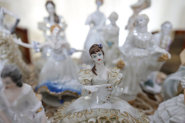 Shallow depth of field (selective focus) details with Romanian communist era ceramic trinkets (bibelouri).