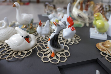 Shallow depth of field (selective focus) details with Romanian communist era ceramic trinkets (bibelouri).