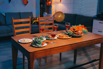 Friends enjoying a Halloween party at a bar making a toast