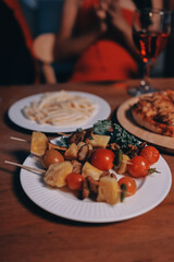 Friends enjoying a Halloween party at a bar making a toast