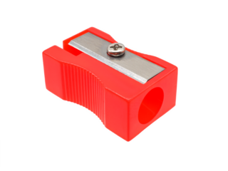 Close up, red pencil sharpener, a tool for sharpening pencils and an essential tool for document work, writing or drawing, isolated on transparent background.