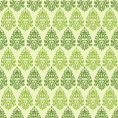 Golden damask pattern on a cream background, evoking a luxurious and classic feel, perfect for vintage-style decor, wallpaper, or print design.