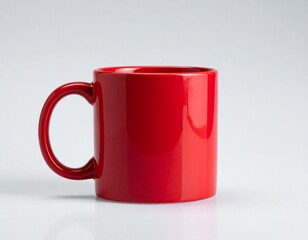 Bright red ceramic mug with white interior and raised heart design on front, featuring nested heart shapes, handle on left side, displayed against plain background.