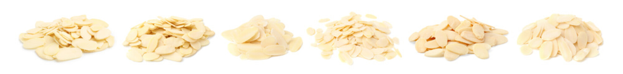 Almond slices in heaps isolated on white, set