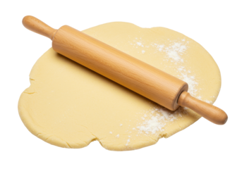 Wooden rolling pin on rolled out dough isolated, baking preparation for cookies or pastry on a clean surface