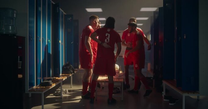 Football Players Form a Motivational Circle, Standing Shoulder to Shoulder, Holding Hands Together, Chanting and Cheering. Locker Room Fills with Team Spirit, Confidence and Brotherhood