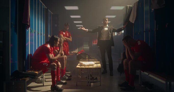 Football Team Sitting in Silence While Their Coach Expresses Frustration Over a Poor Performance. Trainer Kicking a Ball on the Floor, Room Atmosphere is Tense, Filled with Disappointment