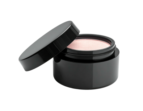 Open black jar of cosmetic product with pinkish contents. Lid partially off