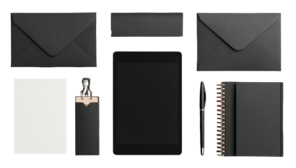 Flat lay of black and white stationery items, tablet, and accessories