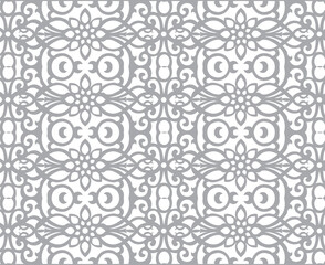 Elegant seamless ornamental pattern with vintage floral motifs, perfect for textile, wallpaper, and decorative design backgrounds