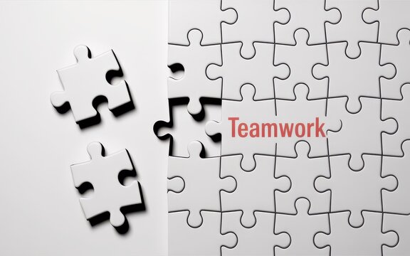 The collaborative essence of teamwork brought to life through a partially assembled jigsaw puzzle, emphasizing unity, strategy, and successful problem resolution in business endeavors
