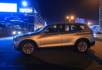 Cars parked in the evening in the city