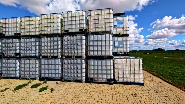 IBC storage tank used to store water liquid for agriculture use