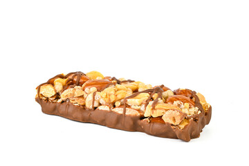 A chocolate bar with nuts and chocolate drizzle
