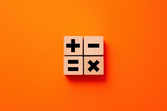 Wooden blocks with basic mathematical symbols for arithmetic on a bright orange background. A minimalist concept for education, finance, and problem-solving