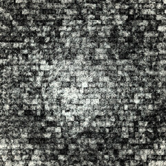 Dark grunge brick wall creating dramatic textured background