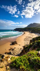 Sunny coastal view of a beach with waves