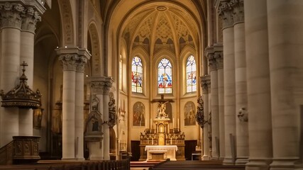 Interior View of a Grand Catholic Church Altar and Stained Glass Windows. - Powered by Adobe