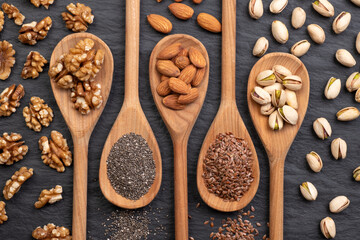 Wooden spoons with nuts and seeds that lower high cholesterol 