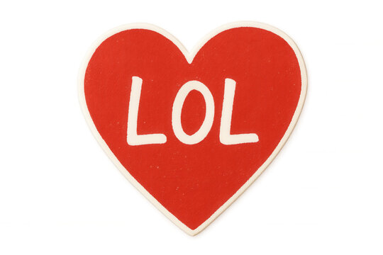 Red heart conversation candy displaying lol message, symbolizing humor, love, and lighthearted communication, transparent background