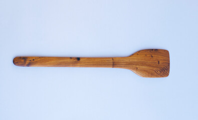 Wooden kitchen utensils stacked view close up isolated