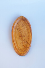 Wooden kitchen utensils stacked view close up isolated