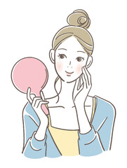 手鏡を見る女性