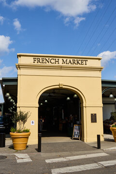 Entrance to the French Market in New Orleans on a sunny day with blue sky