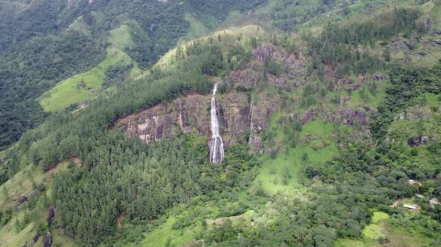 Aerial Drone View of Bambarakanda Falls, Sri Lanka &ndash; Tallest Waterfall Surrounded by Lush Tropical Forest and Mountain Landscape