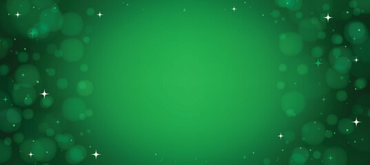 Festive green Christmas background with glowing bokeh lights and sparkling stars. © Grafiqwrk