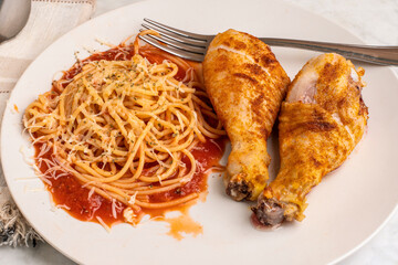 spaghetti  with seasoned  chicken drum sticks