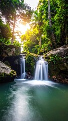 Obraz premium Scenic Waterfall Cascading into Turquoise Pool Surrounded by Lush Green Vegetation and Sunlight Filtering Through Trees in Tropical Forest