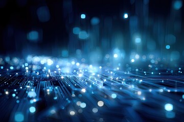 Abstract view of a circuit board lit with electric blue bokeh and digital light