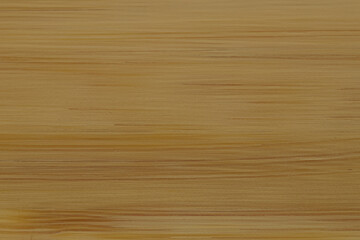A smooth wood surface texture closeup background