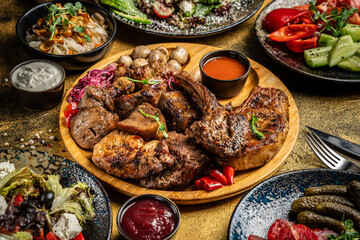 Grilled meat platter with assorted salads