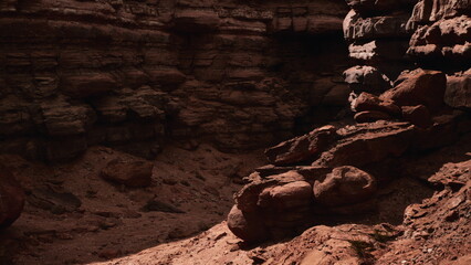 Dusk settles over a secluded canyon where bold rock formations create a dramatic scene. Shadows deepen as light fades, revealing the untouched beauty of natures artistry.