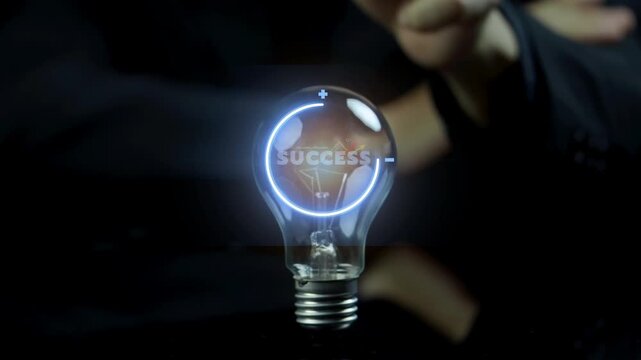 Businessman shows animated success icon inside glowing light bulb. Represents corporate vision, business goals, teamwork and achieving a common mission.