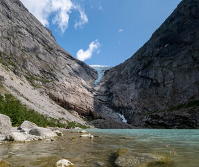Briksdal glacier with a mountain lake in the foreground, Norway