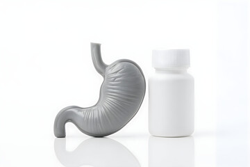 Human Stomach Beside Medicine Bottle