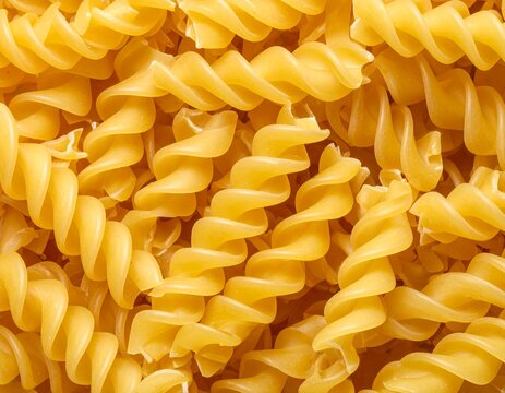 Heap of uncooked fusilli pasta