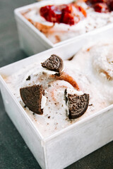 Delicious dessert bowls filled with creamy ice cream and cookie pieces