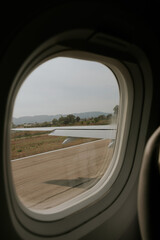 Beautiful view of an airplane wing on the runway.